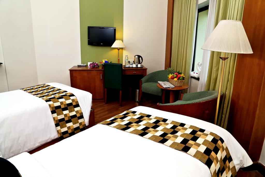 Hotel Gokulam Park Kochi Zimmer foto